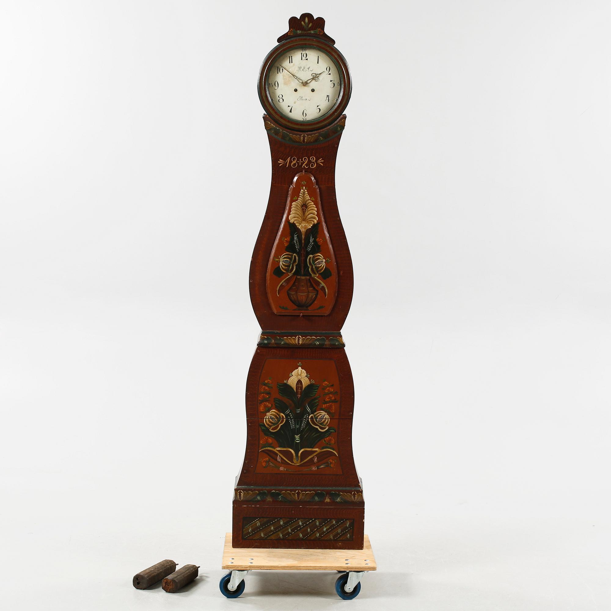 A grandfather clock dated 1823.