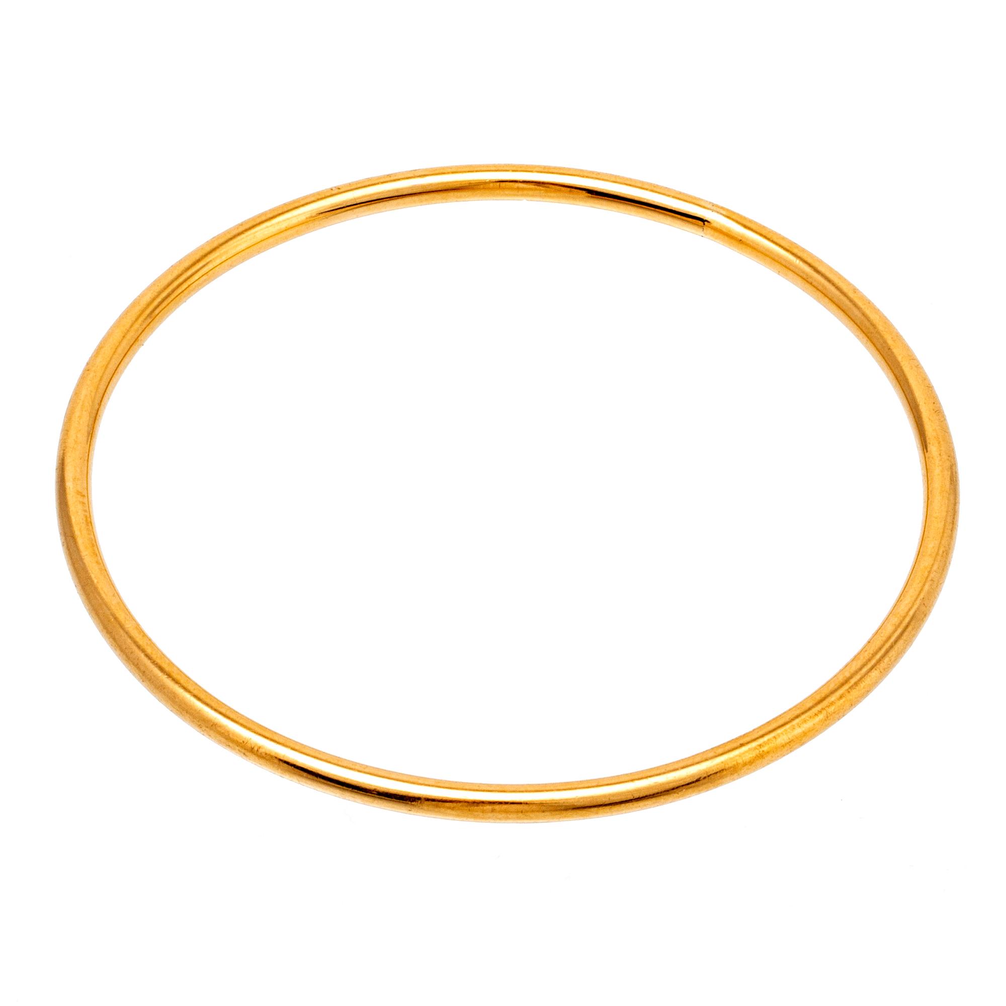 Bangle 18K gold, 23,6 g, inner circumference approx 19 cm, does not open.