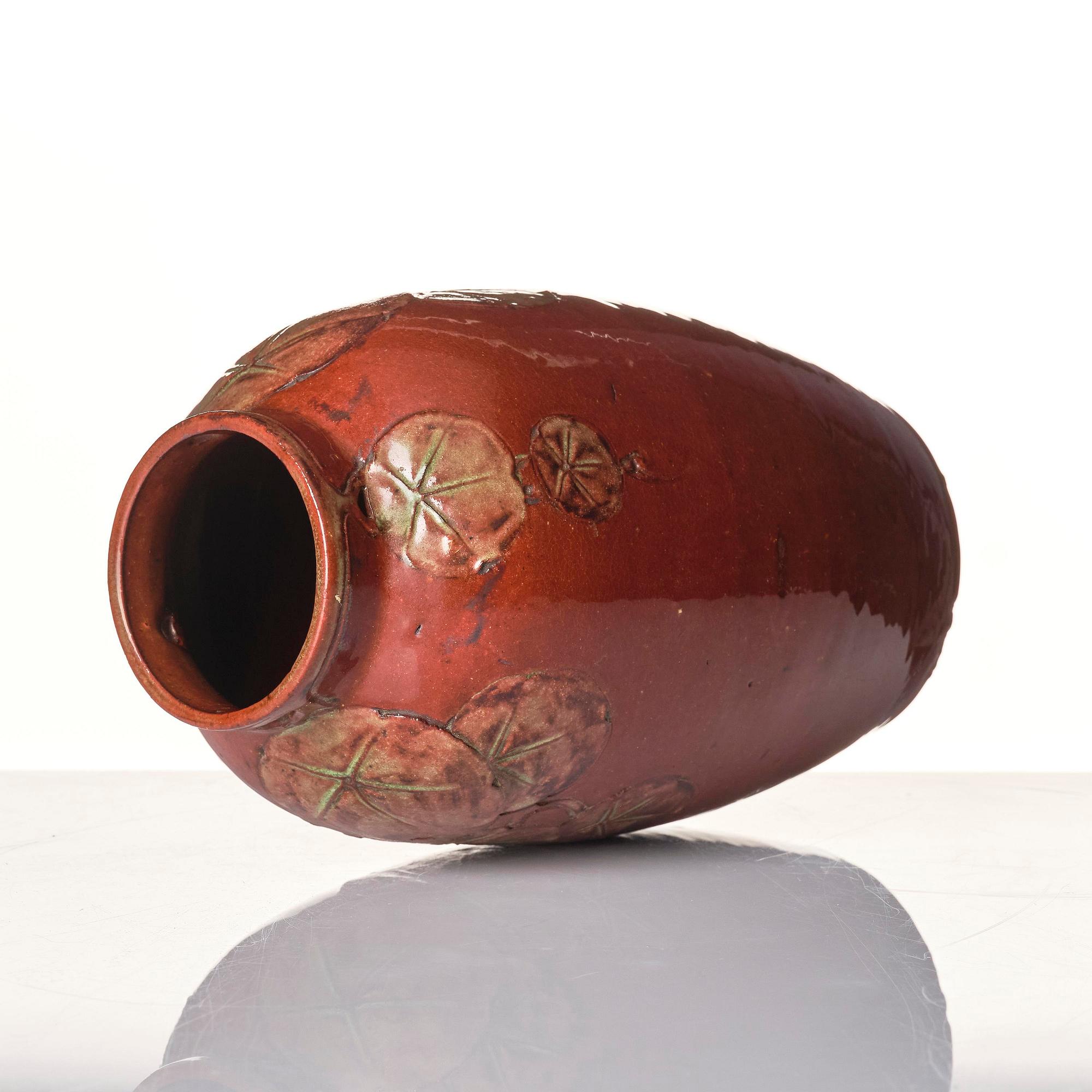 Hilma Persson-Hjelm, a glazed earthenware art nouveau vase, executed in her studio, Arvika, 1908. No 454.