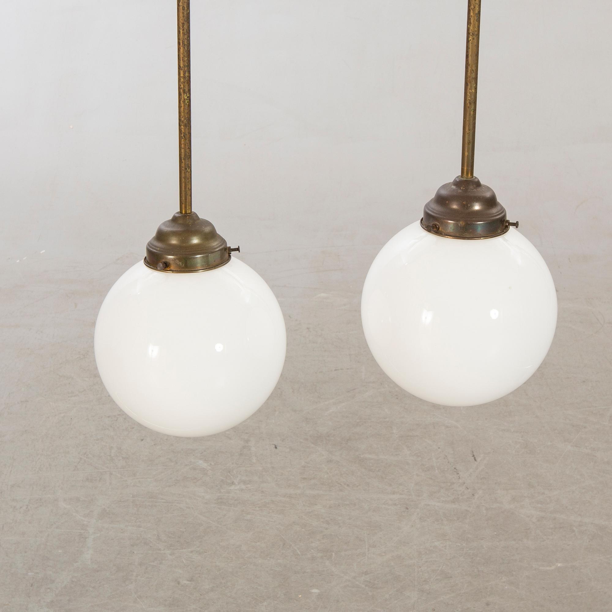A pair of 1940/50s ceiling lamp.