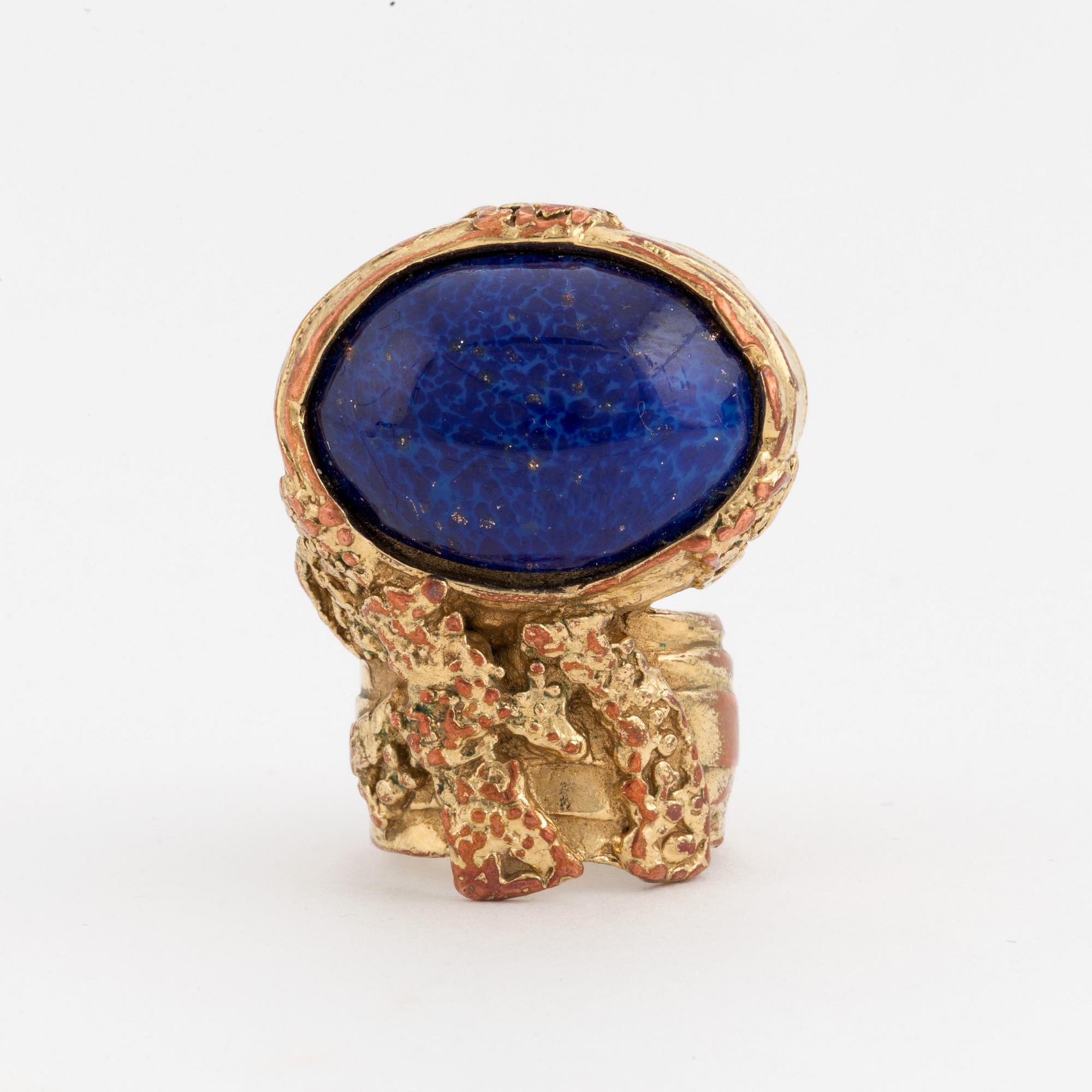 A ring by YVES SAINT LAURENT,