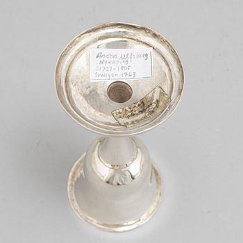 A Swedish 18th / 19th century silver beaker, cup and caster-spoon.