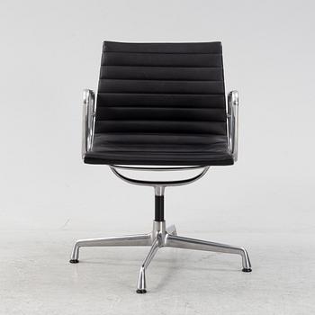 An EA 108 swivel office chair by Charles and Ray Eames for Vitra.