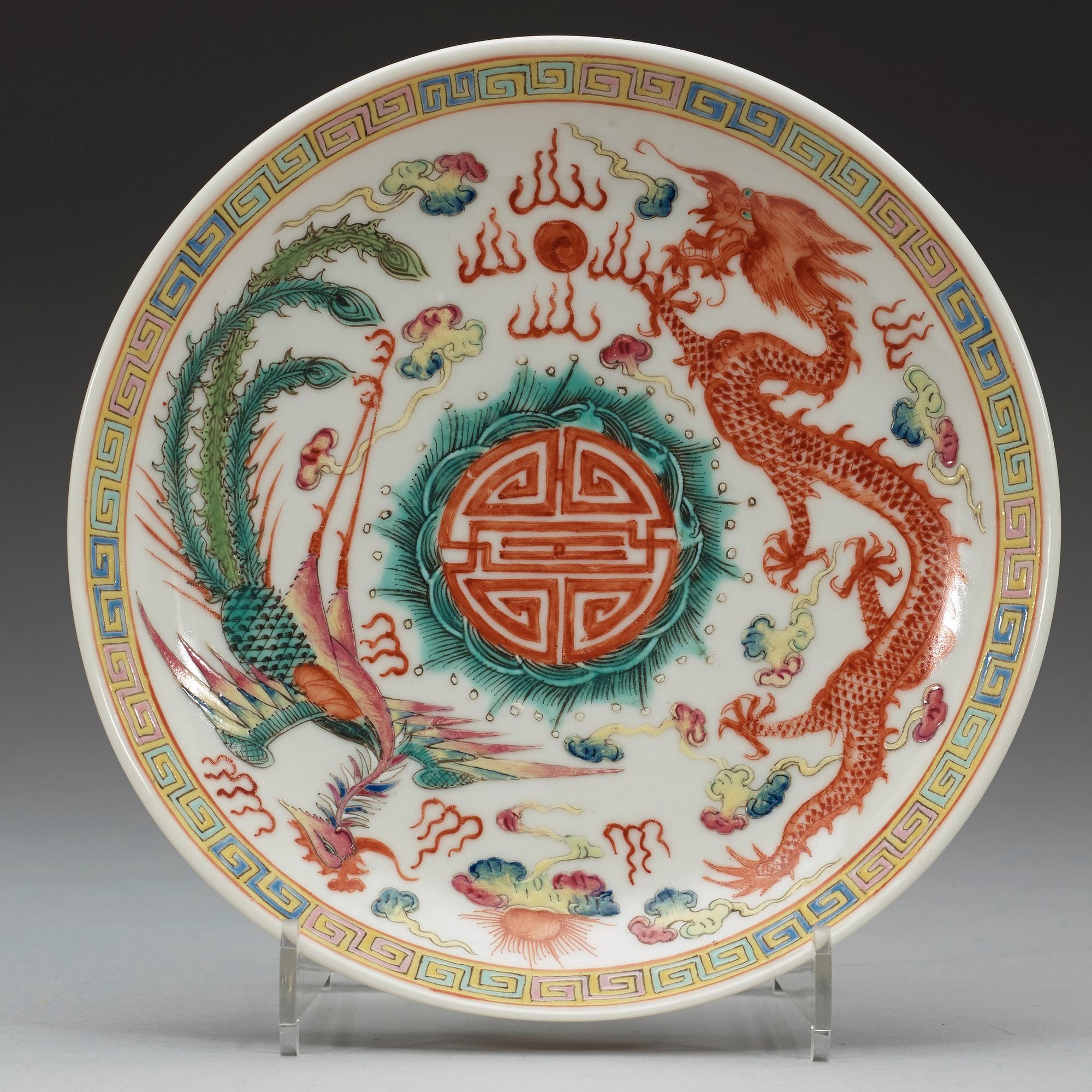 A set of three phoenix and dragon famille rose dish, Qing dynasty with Guangxu six character mark and period (1875-1908).