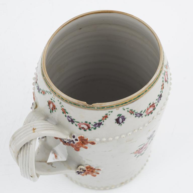 A porcelain Famille Rose Mug and three Dishes, China, Qinlong (1736-95).