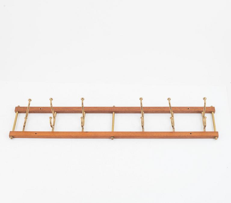 Klädhängare, "Dekorativ", Skoglunds metallgjuteri, Anderstorp, 1900-talets mitt.