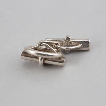 HERMÈS, a pair of silver cuff links.