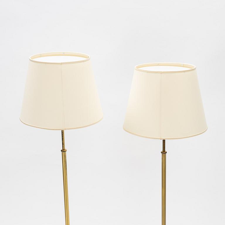Josef Frank, a pair of model 2326 brass floor lamps, Firma Svenskt Tenn.