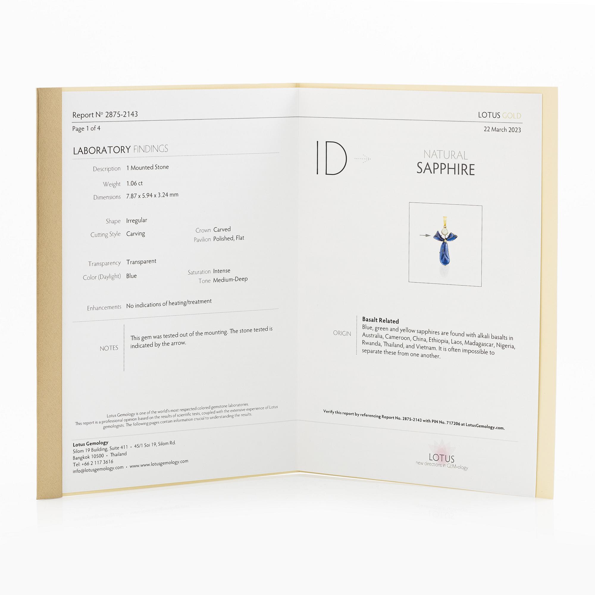 Pendant, 18K gold with carved sapphires, white sapphire, and a small rose-cut diamond.