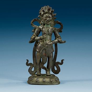 A bronze figure of Mahakala.