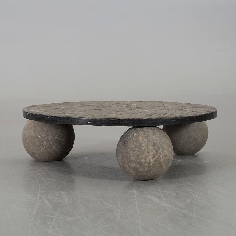 A 20th century stone sofa table.