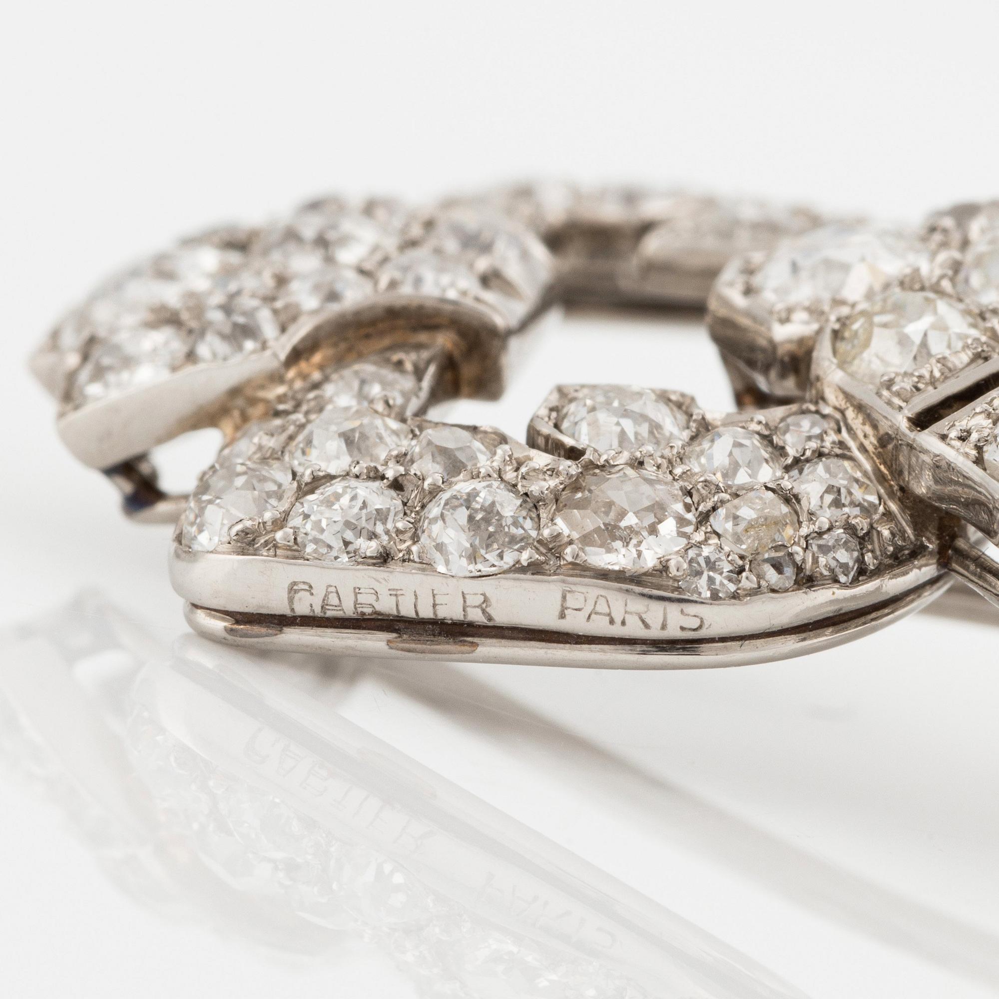 A Cartier platinum brooch set with old-cut diamonds, Art Déco.