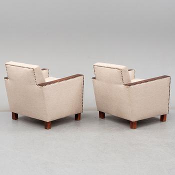 A 1930's pair of model 184 easy chairs by Björn Trägårdh, Firma Svenskt Tenn.