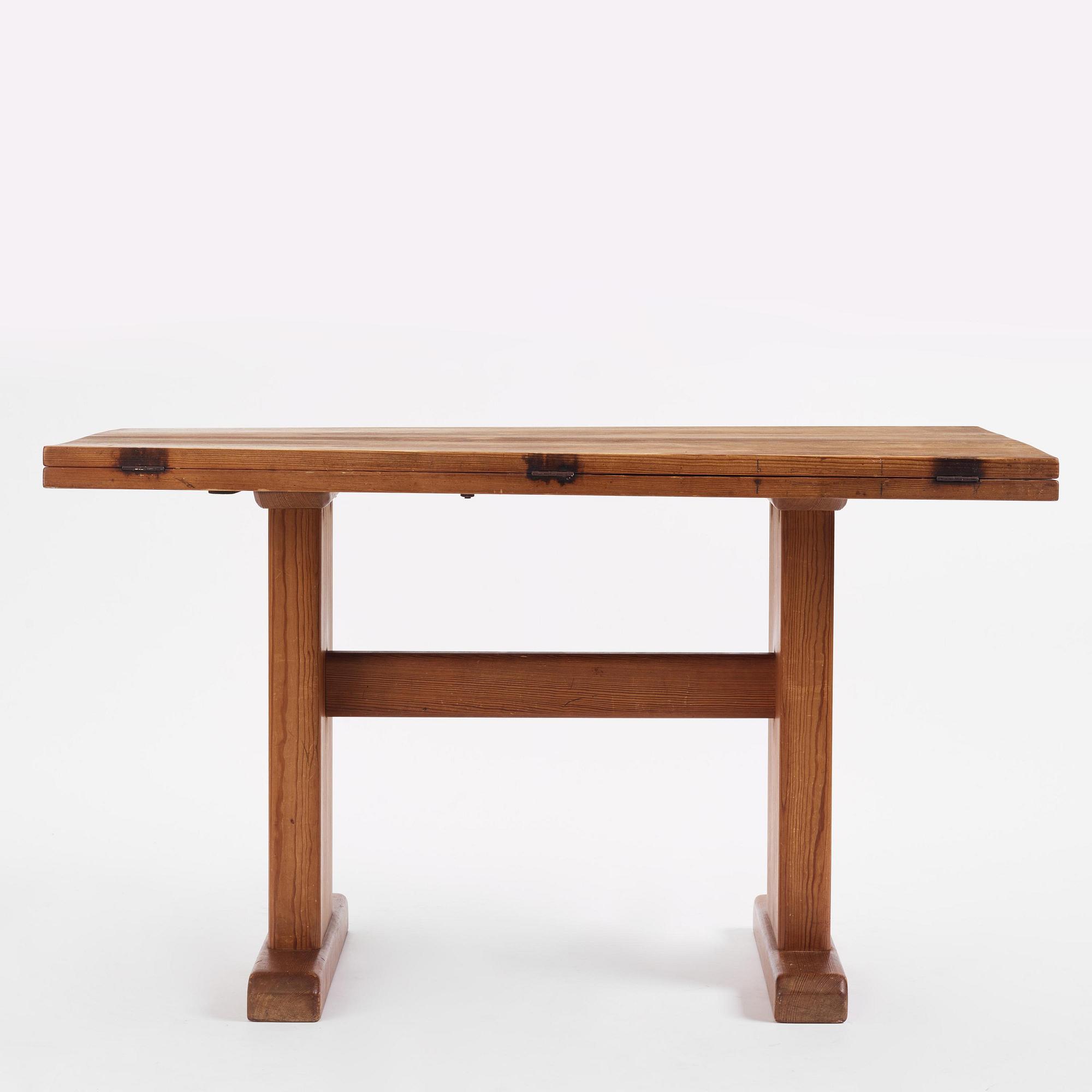 Carl Malmsten, a stained pine table, Sweden, 1930s.