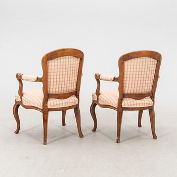 A pair of 19th century Rococo style armchairs.