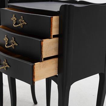A pair of Rococo style bedside tables, second half of the 20th Century.
