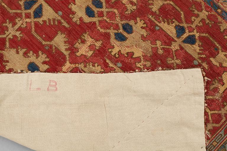 A CARPET FRAGMENT, an antique Western Anatolian "Lotto", 17th century, ca 105 x 125 cm.