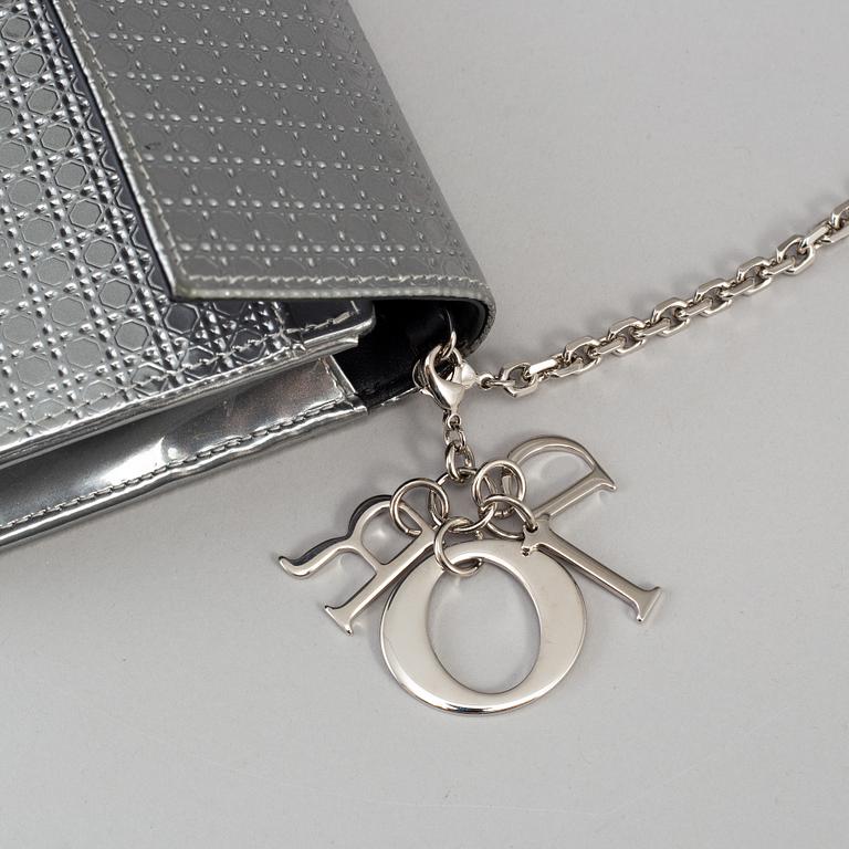CHRISTIAN DIOR, an embossed metallic leather 'Wallet on Chain' clutch.