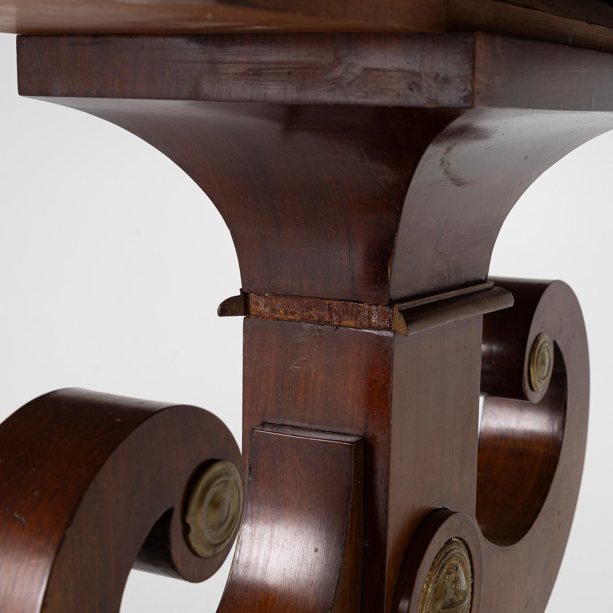 An Empire table, first half of the 19th century.