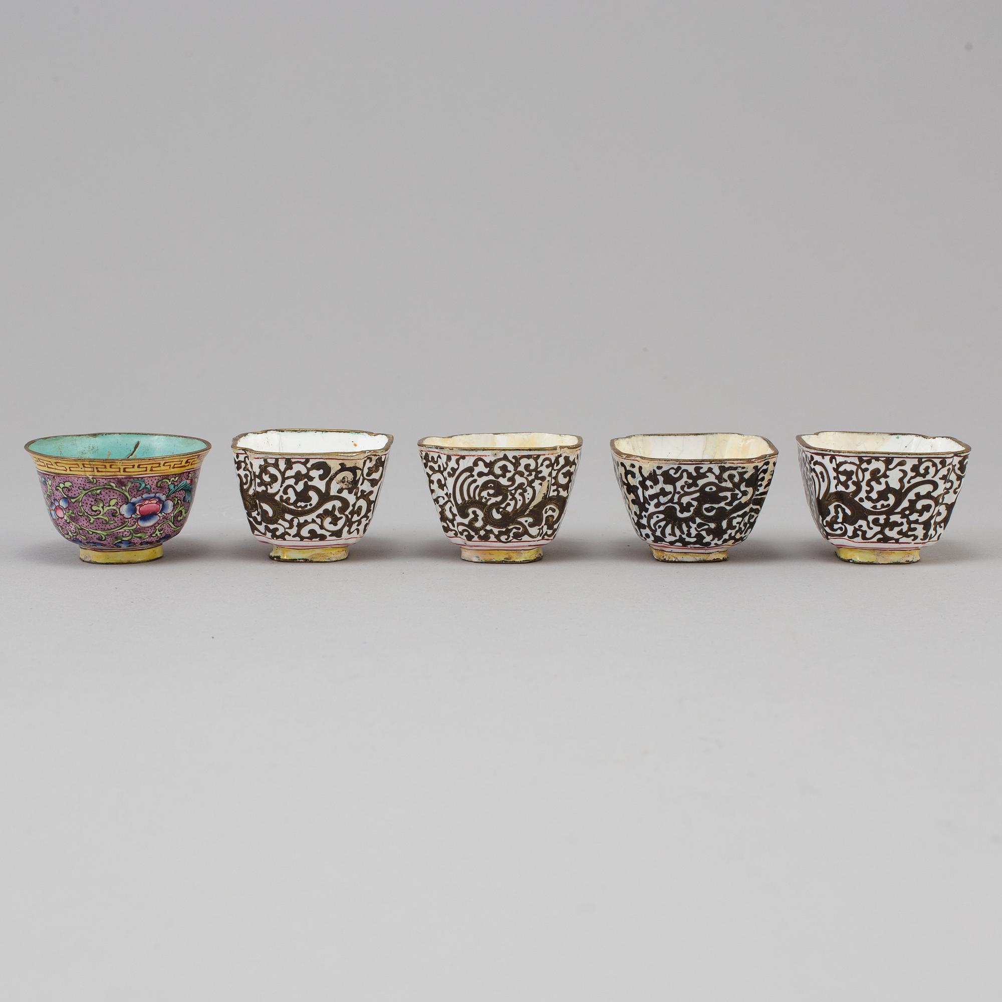 A chinese cloisonné tray, 20th century, and five enamel on copper cups, late 19th/early 20th century.