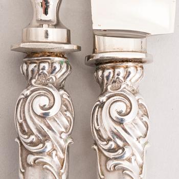 Silver serving cutlery, three with mark of Ferdinand Timper, Helsinki 1901-02 and a pair with German marks, ca. 1900.