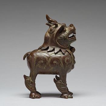 A bronze censer in the shape of a mythical beast, Qing dynasty (1664-1912).