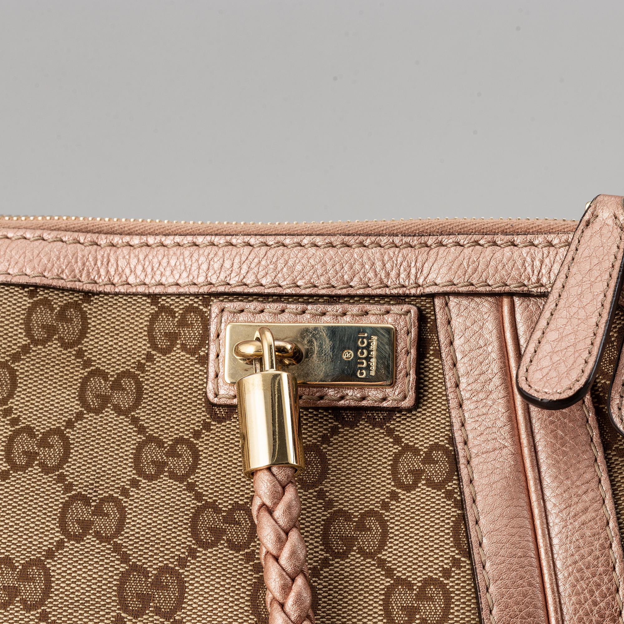 Gucci, a monogram canvas bag.