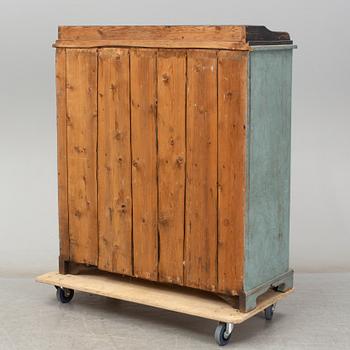 A mid 19th century painted cupboard.