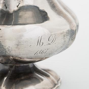 A silver cream jug, maker's mark of Michael Takkinen, St. Petersburg 1856.