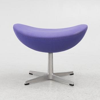 Arne Jacobsen, an armchair with footstool, "The Egg", Fritz Hansen, Denmark, 2003.