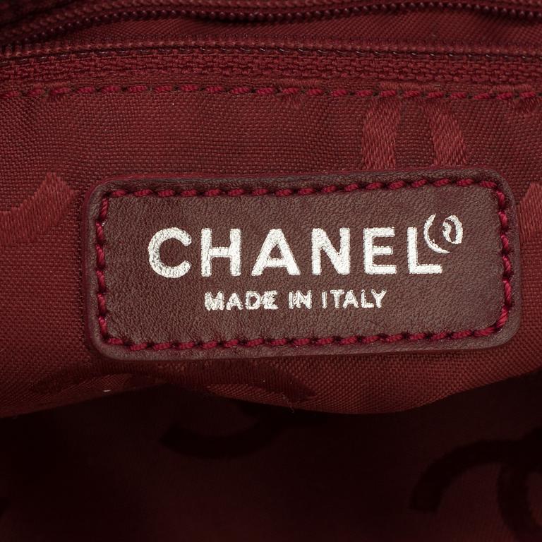 A TOILET BAG by Chanel.