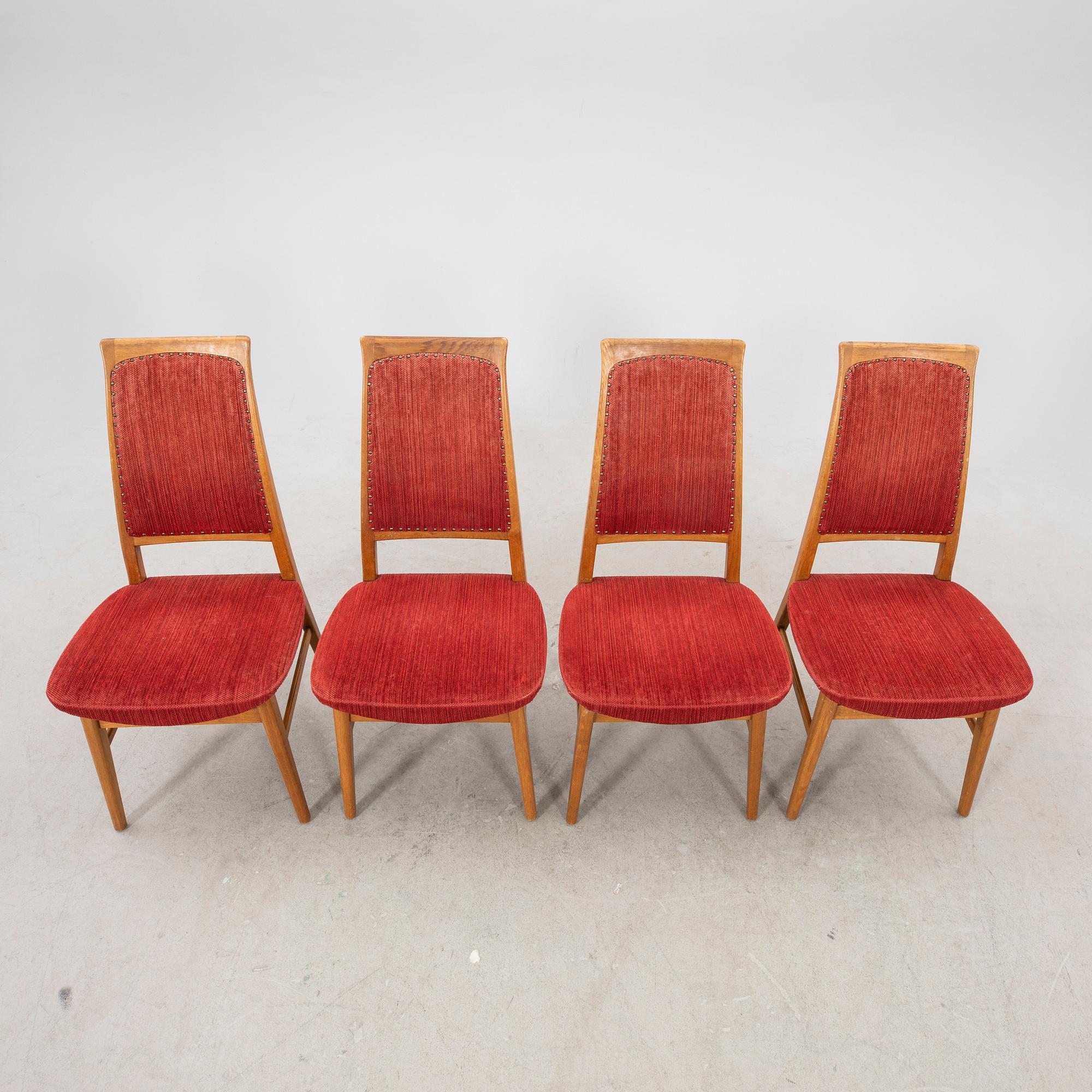 A set of four  mid 1900s teak chairs.