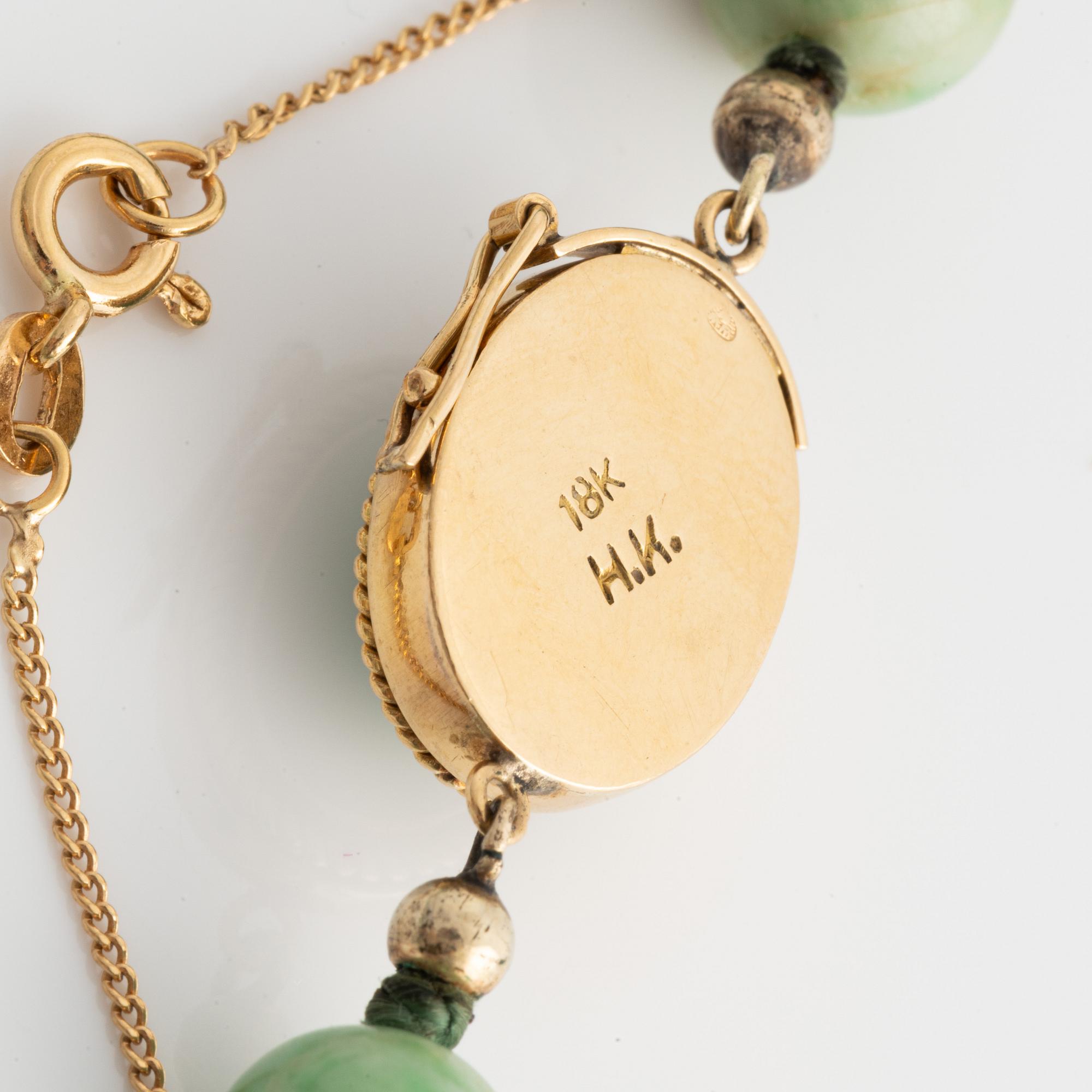 Necklace and a pair of earrings.