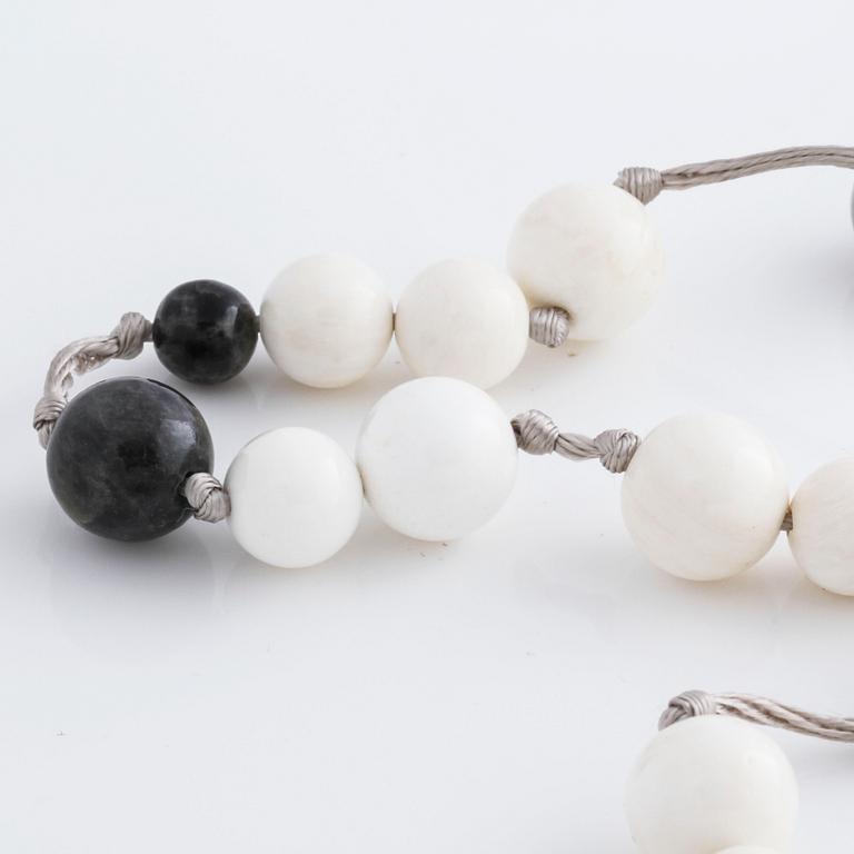 A quartz and mother of pearl necklace by Ole Lynggaard.