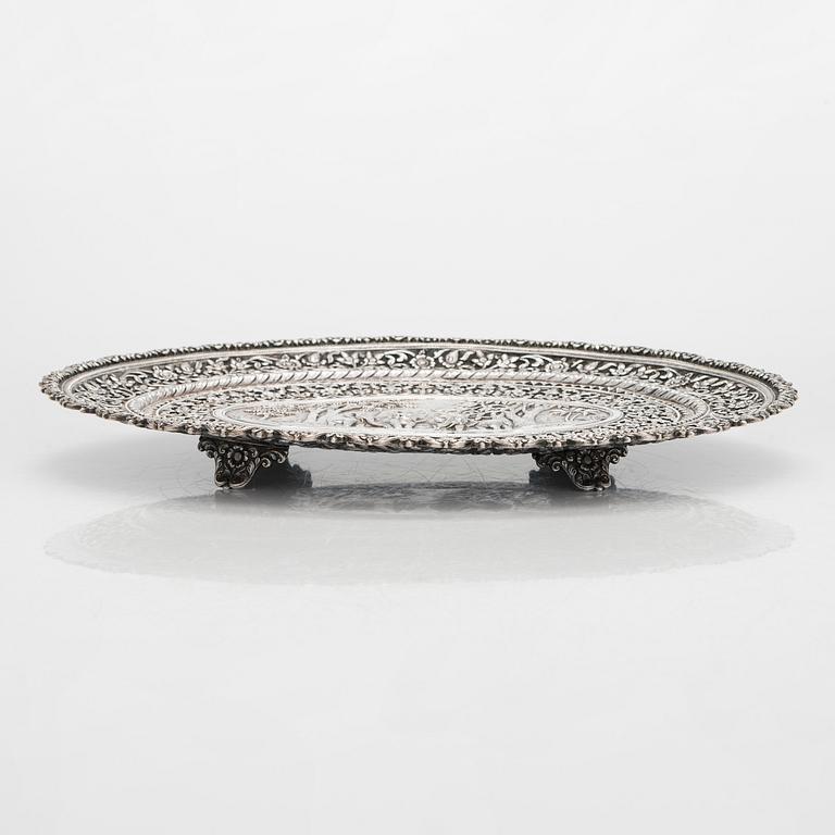 A silver salver, marked OM BHUJ for Oomersi Mawji, Bhuj, Kutch, India, circa 1860-1890.