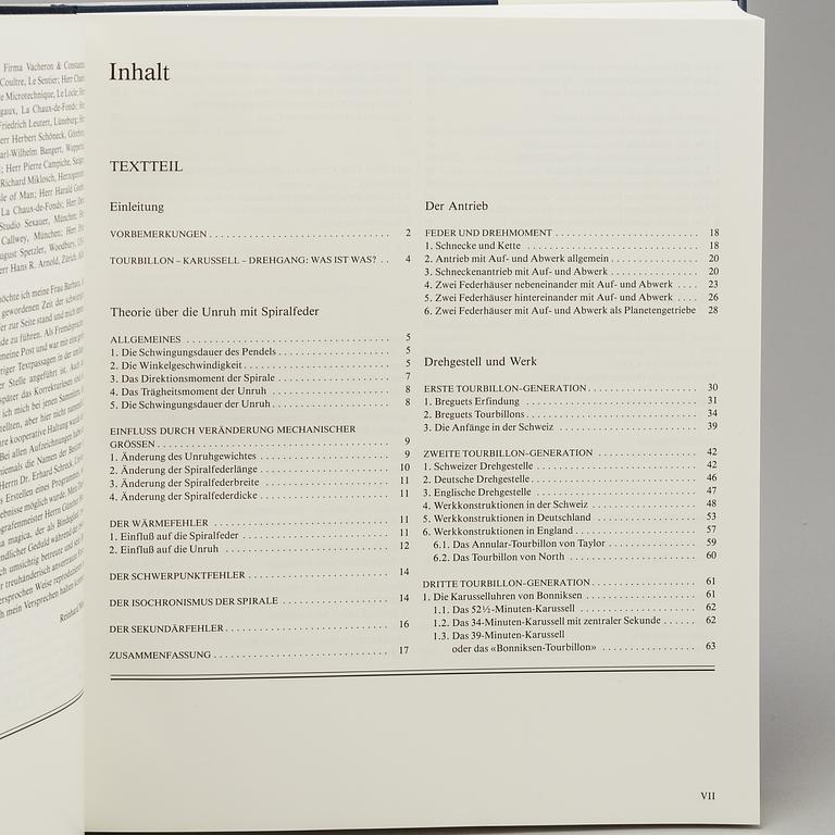 A set of 5 watch books.