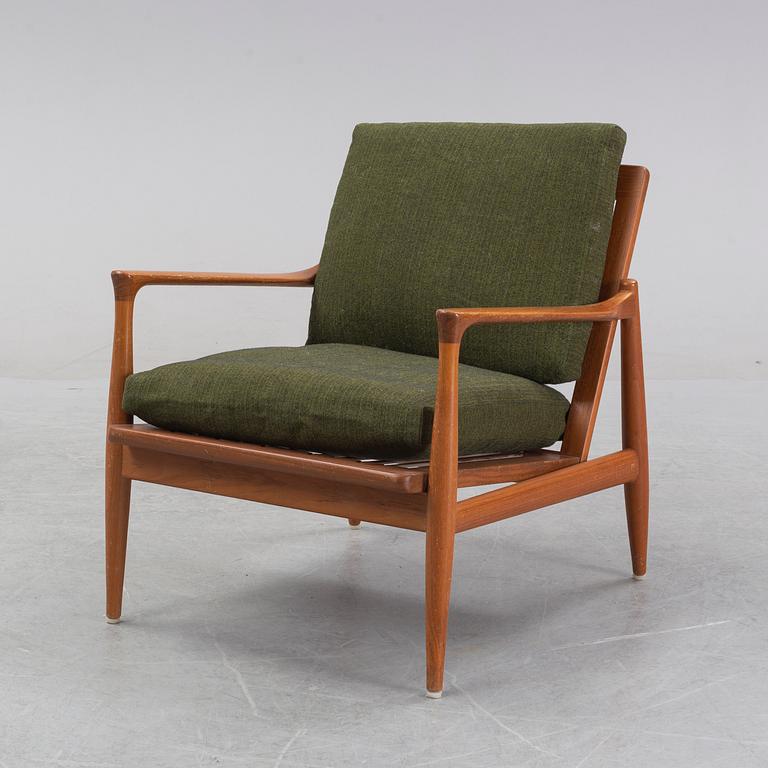 A 1950's/60's teak and oak easy chair.