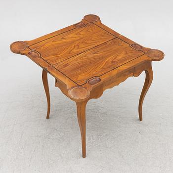 A rococo card table, mid 18th century.