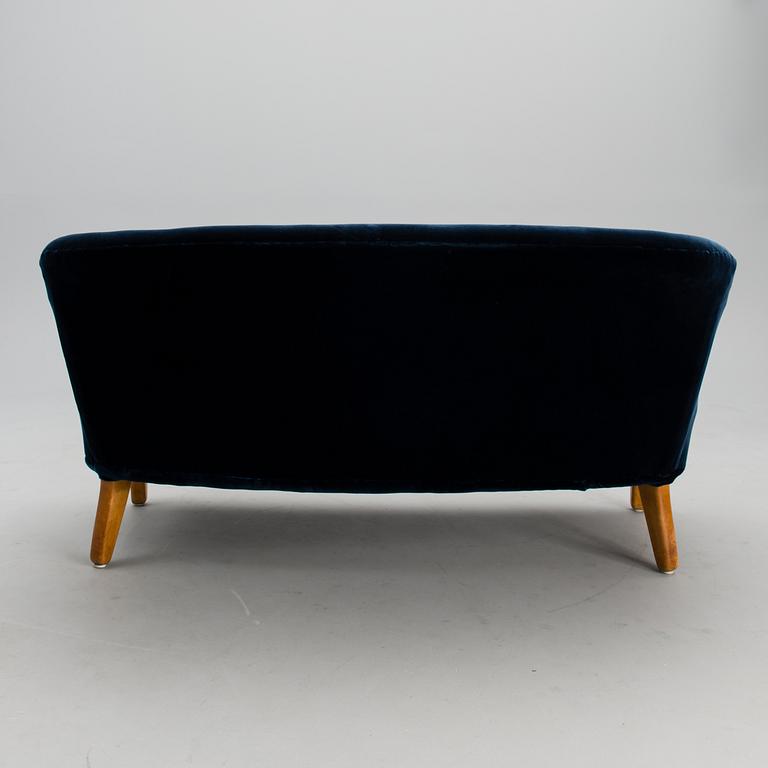 A sofa from the mid 20th century.