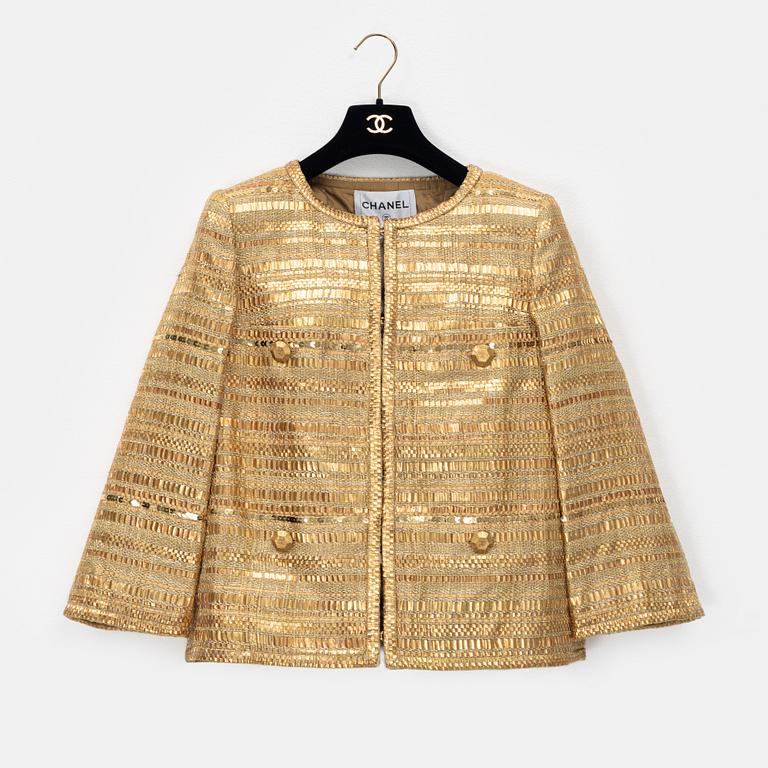 Chanel, a gold bouclé jacket, size 34.