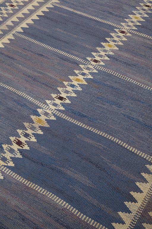 Barbro Nilsson, a carpet, "Salerno blå", flat weave, ca 312 x 201,5-205,5 cm, signed AB MMF BN.