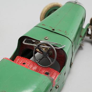 Three toys from Meccano and Schuco, around the mid 20th century.