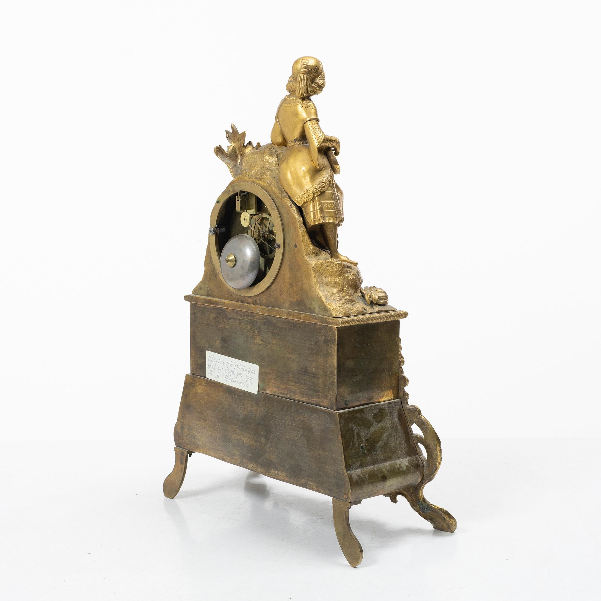 A table pendulum clock, late 19th century.