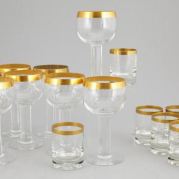 A set of 25 (13+12) Gunnar Cyren wine glasses, Orrefors, Sweden.