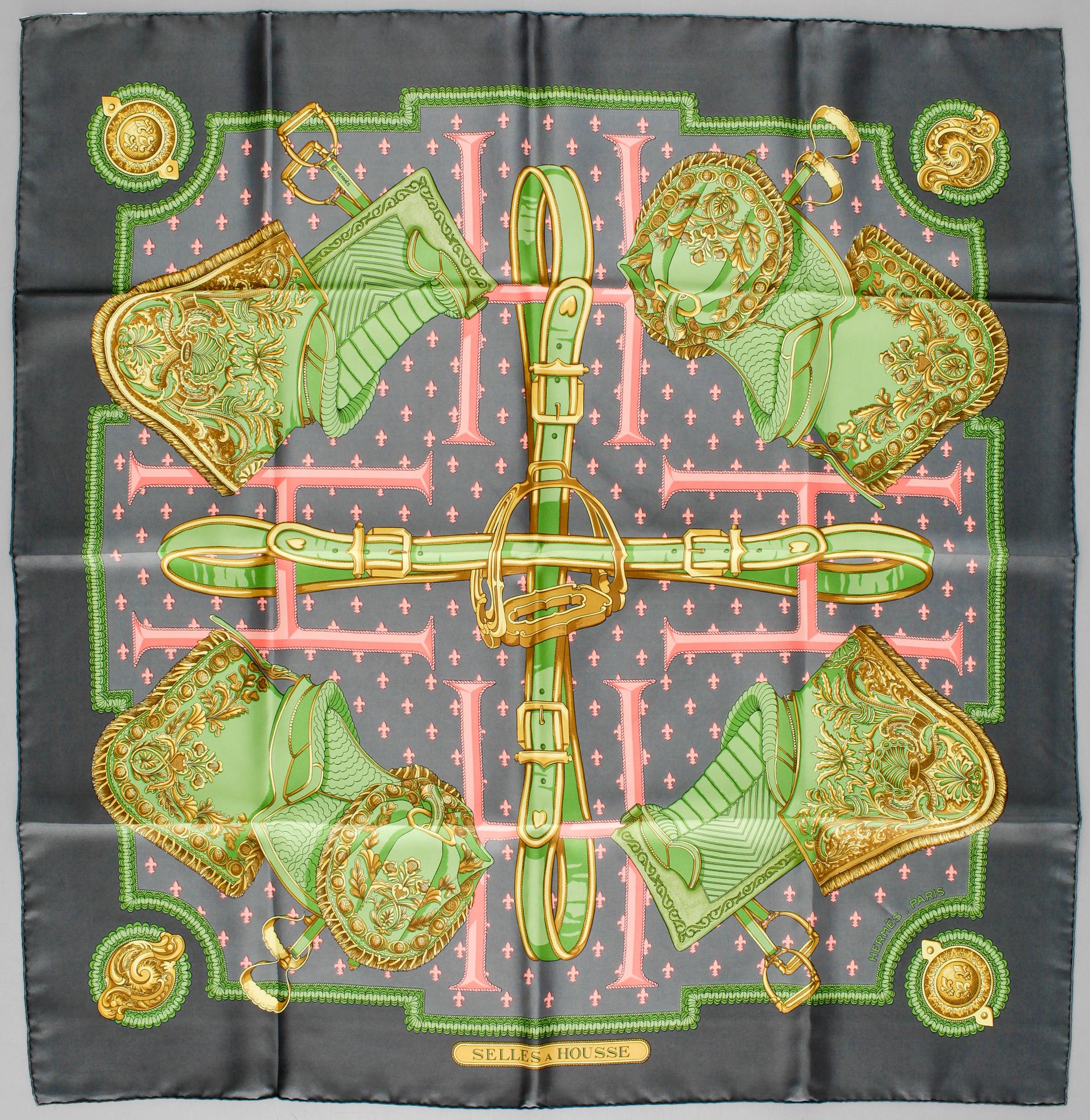 A silk scarf "Selles a Housse" by Hermès.