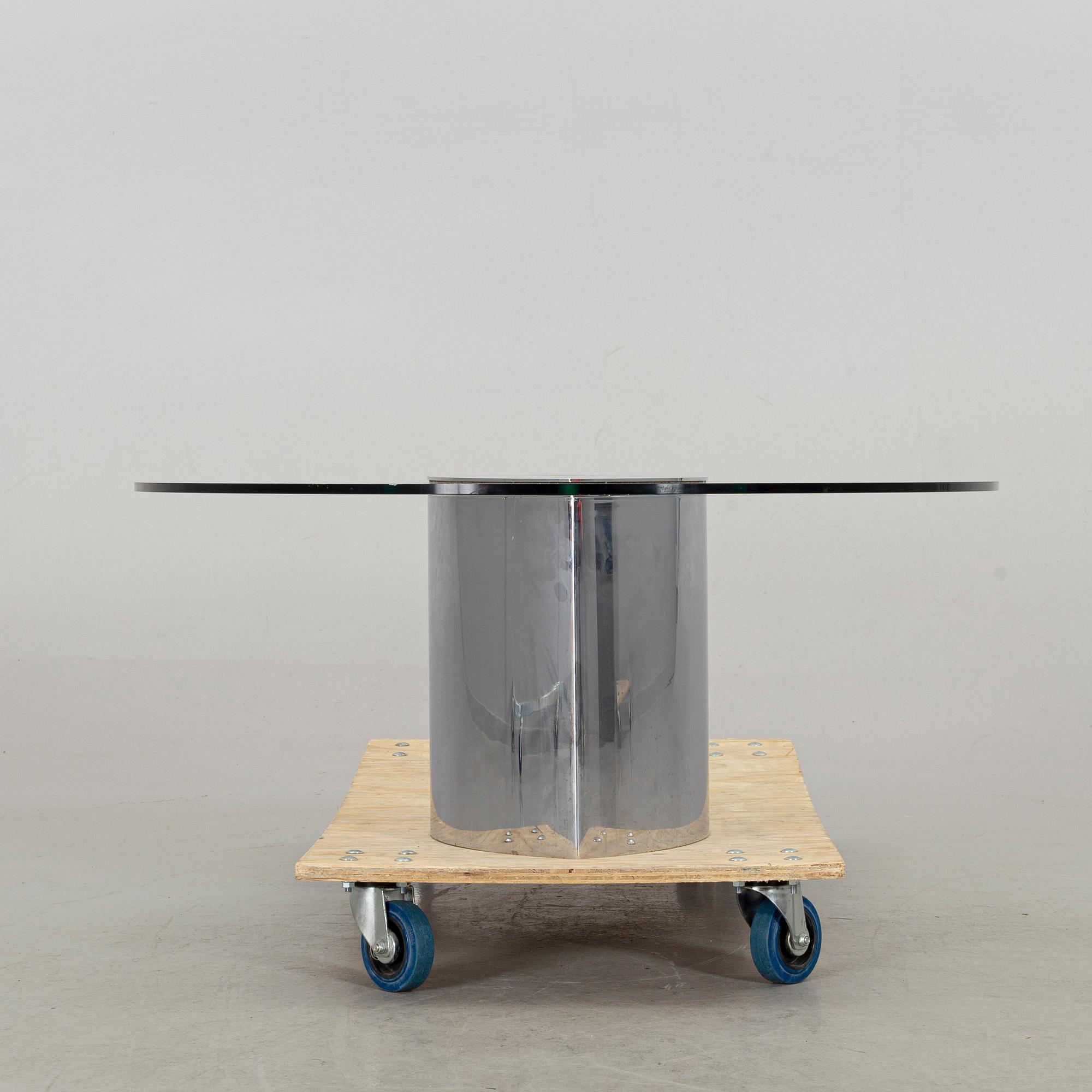 A GLASS TOP COFFEE TABLE "LUNARIO" CINI BOERI.