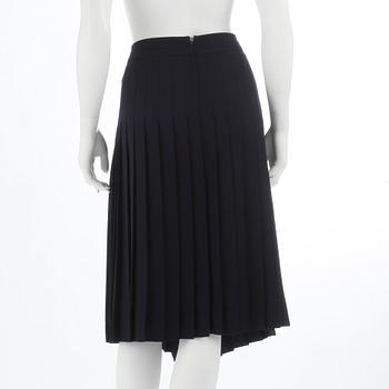 CÉLINE, a blue woolblend pleated skirt. Size 44.