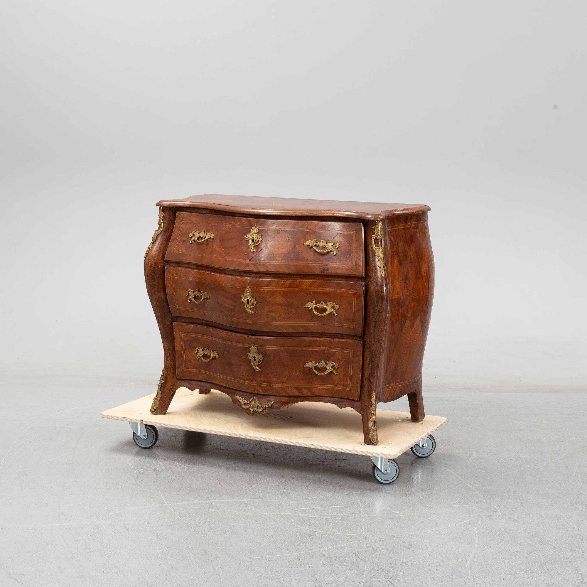 A 19th Century rococo style dresser.