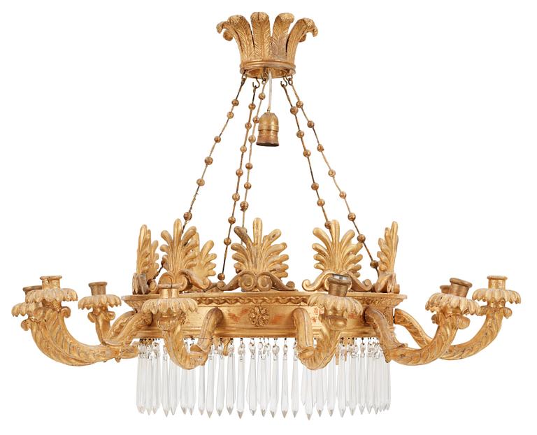 A German Empire 19th century ten-light gilt wood hanging lamp, possibly after K. F. Schinkel.