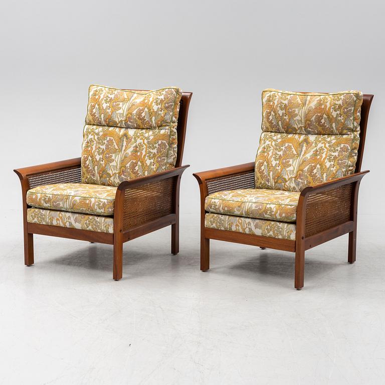 Arne Norell, a pair of 'Rotang' easy chairs, Norell Möbel AB, Sweden.